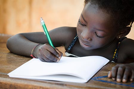 African Young Girl Writing Notes